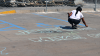 Girl Writes Justice for Mike Brown in Chalk Ferguson Missouri